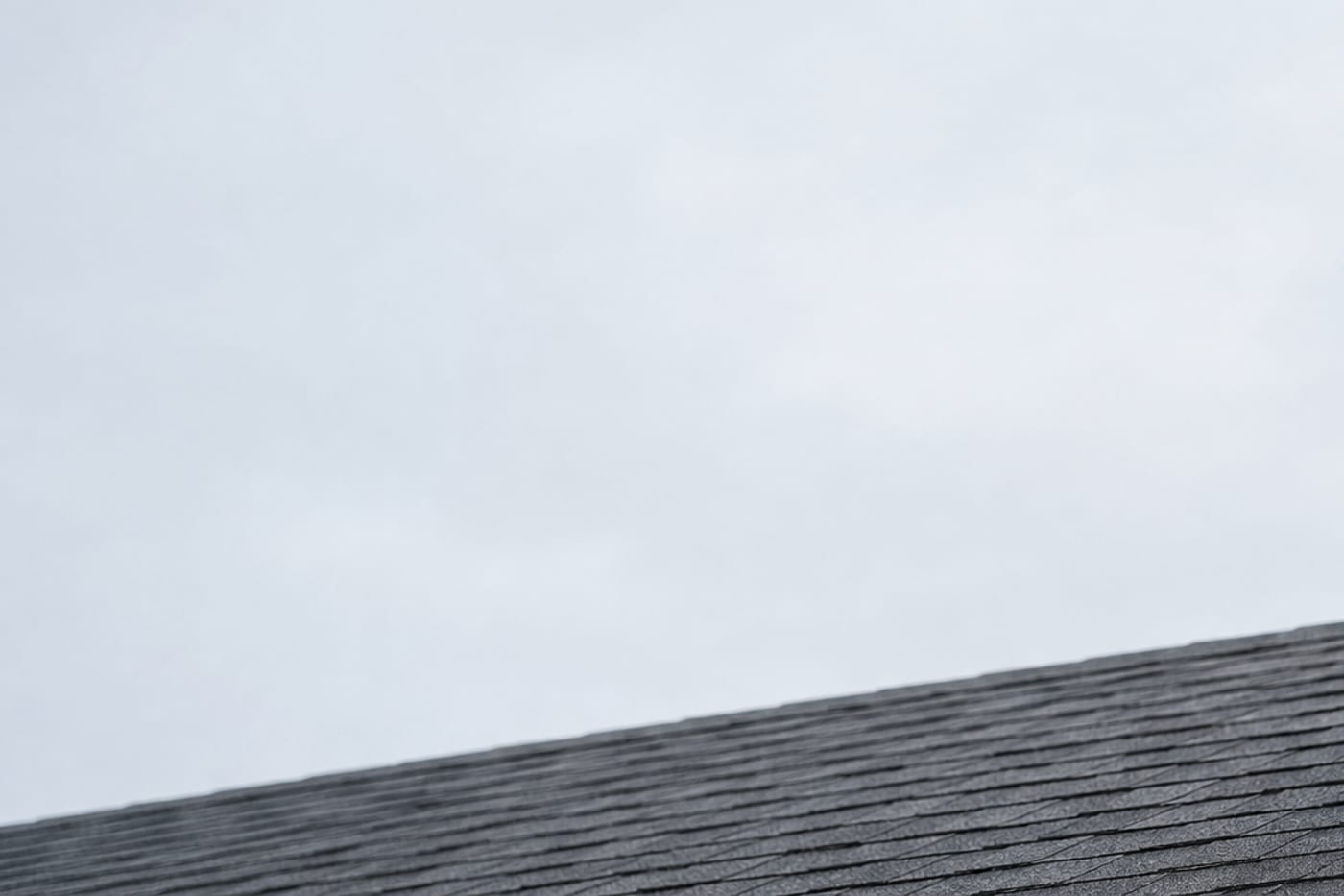 Close-up of residential roof shingles.